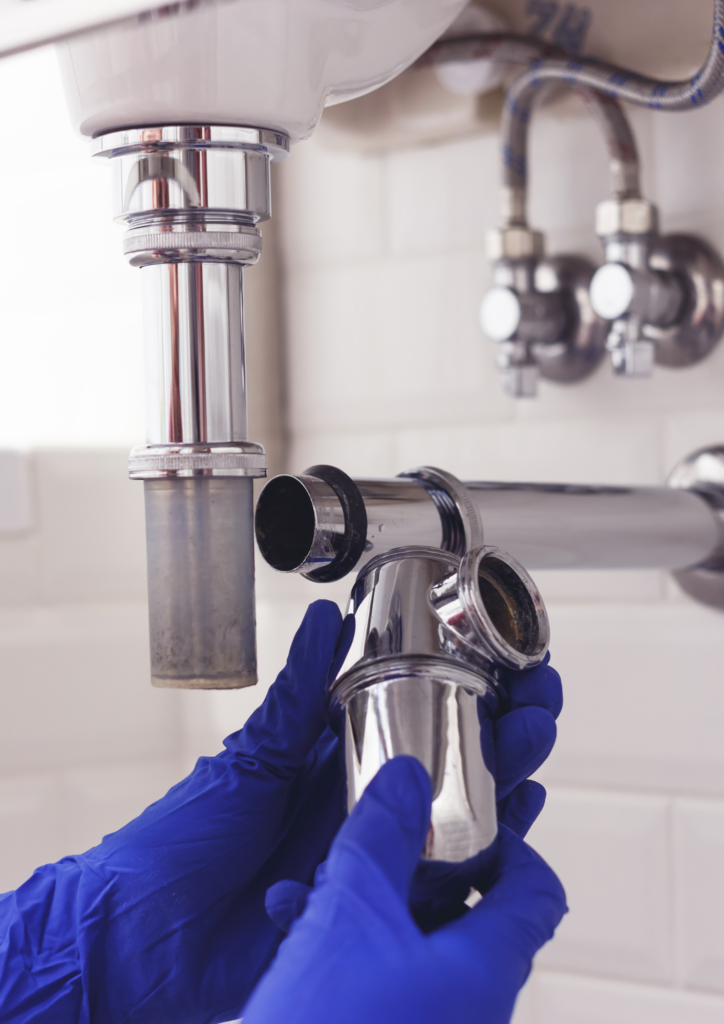 Plumbing maintenance on a sink.